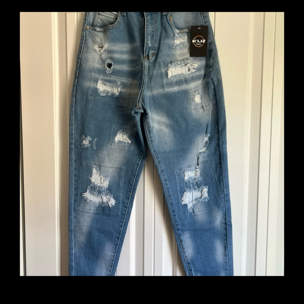 Women's Distressed Blue Jeans